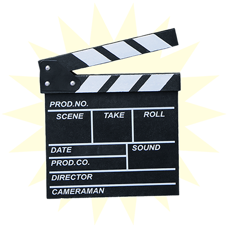 Clapboard with yellow starburst shape behind it